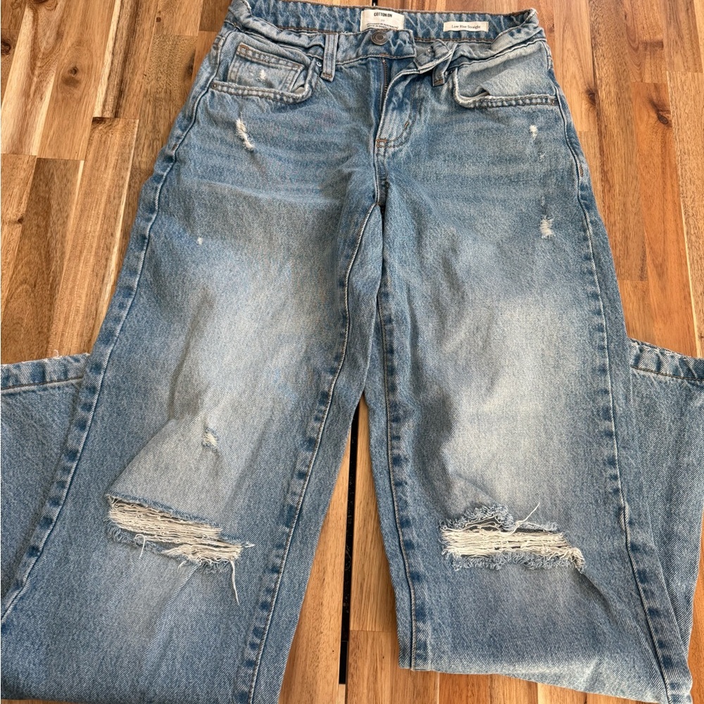 Distressed Blue Jeans